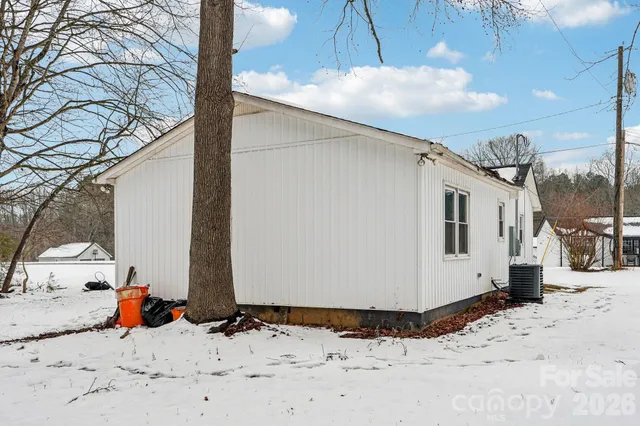 a view of a covered with snow in the yard