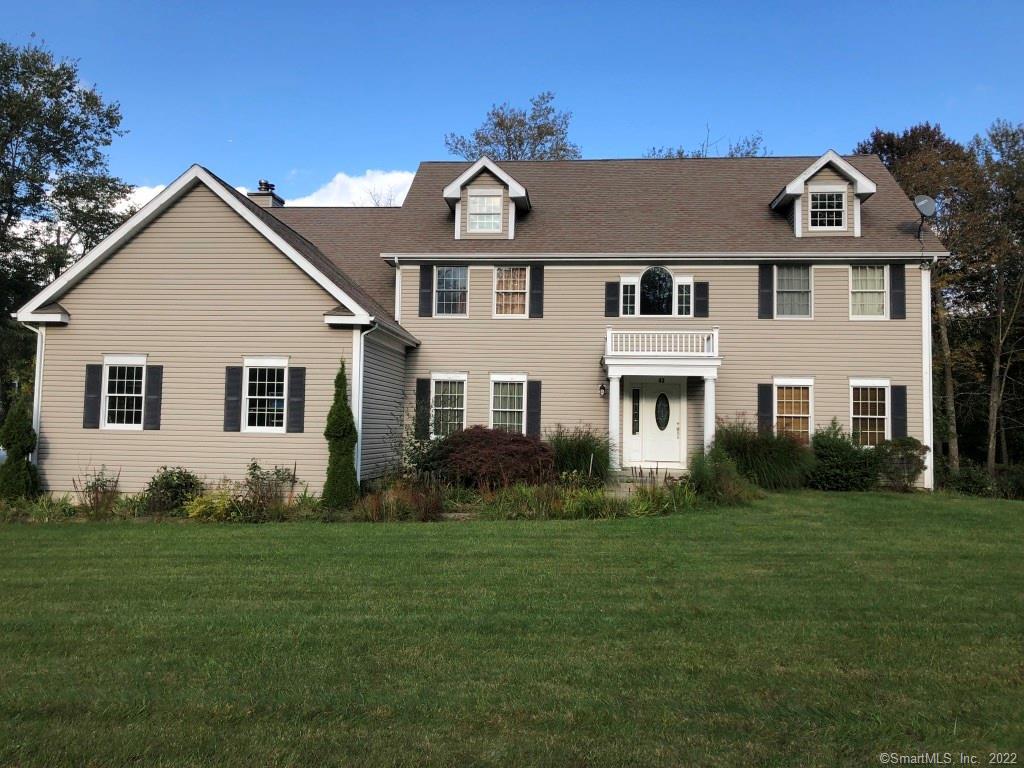 43 Milltown Road Danbury, CT 06811 - Photo 1 of 1 a front view of a house with a garden