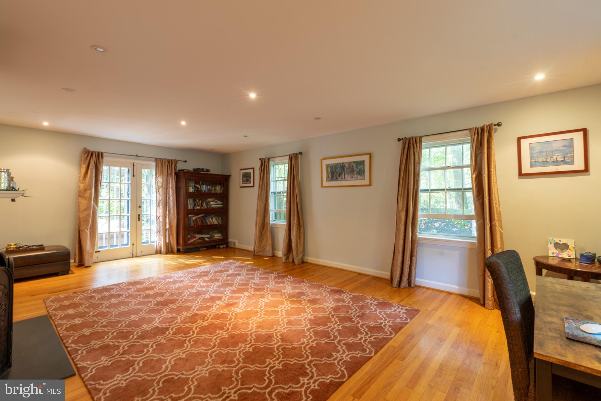 311 Pine Tree Road Wayne, PA 19087 - Photo 4 of 24 Living room with French doors to patio.