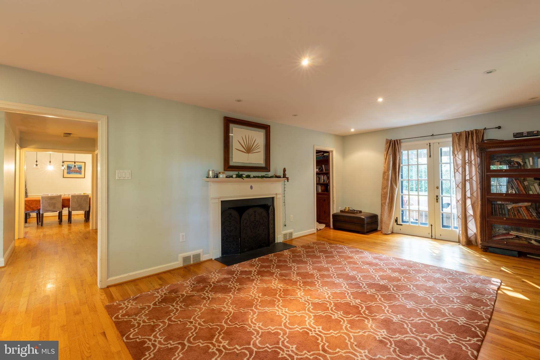 311 Pine Tree Road Wayne, PA 19087 - Photo 5 of 24 Living room with fireplace.