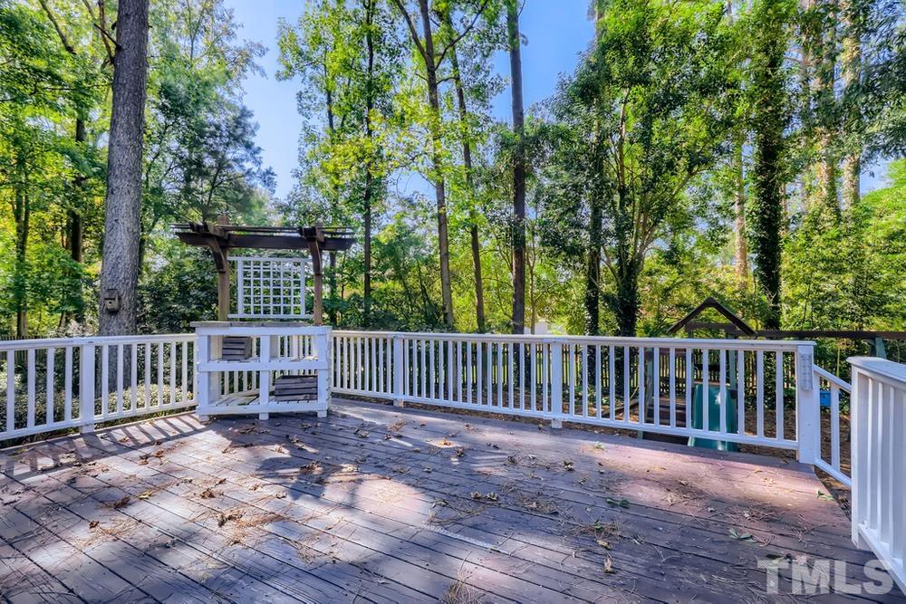 7301 Sandy Grove Court Raleigh, NC 27615 - Photo 24 of 28 a view of a deck