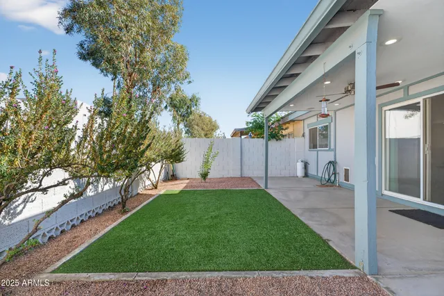 a view of a porch with a yard