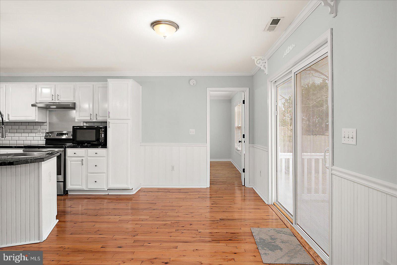 36405 Poplar Neck Road Willards, MD 21874 - Photo 22 of 50 a view of a kitchen from the hallway