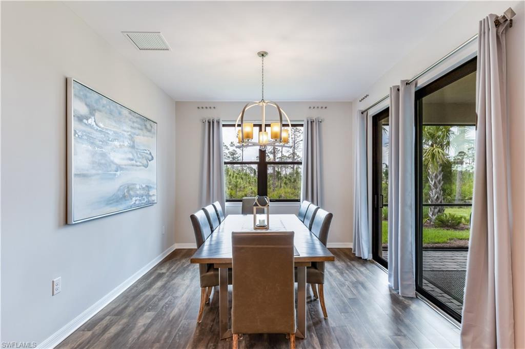 16216 Palmetto Street Babcock Ranch, FL 33982 - Photo 10 of 16 a view of a dining room with furniture window and wooden floor