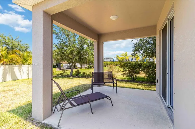 a bench sitting in front of a building