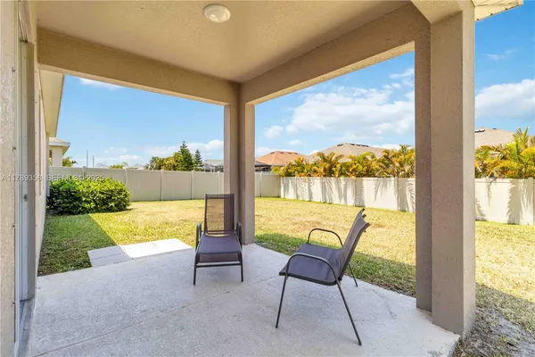 a view of a swimming pool and a porch