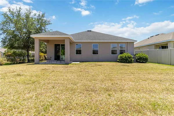 a front view of house with yard