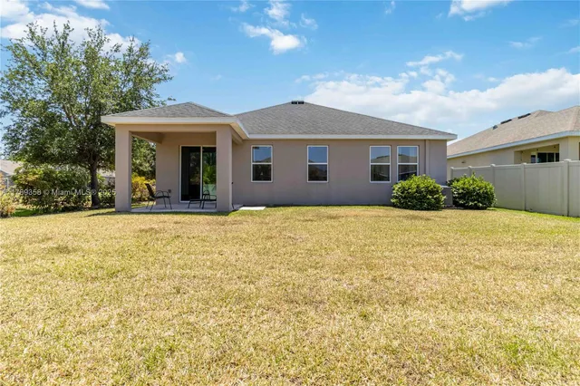 a front view of house with yard