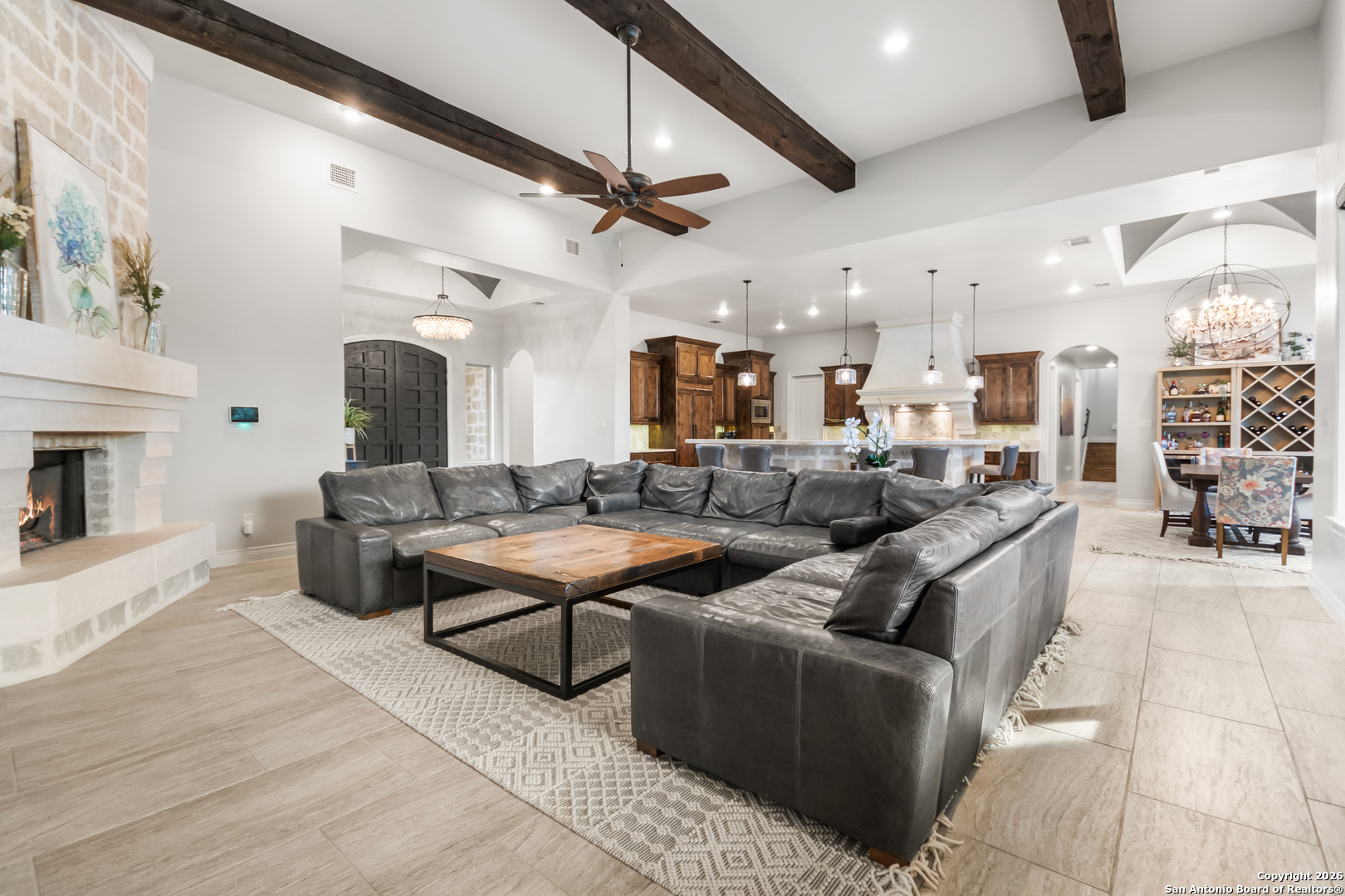 9 Ranch Brook Road Boerne, TX 78015 - Photo 13 of 59 a living room with lots of furniture and a fireplace