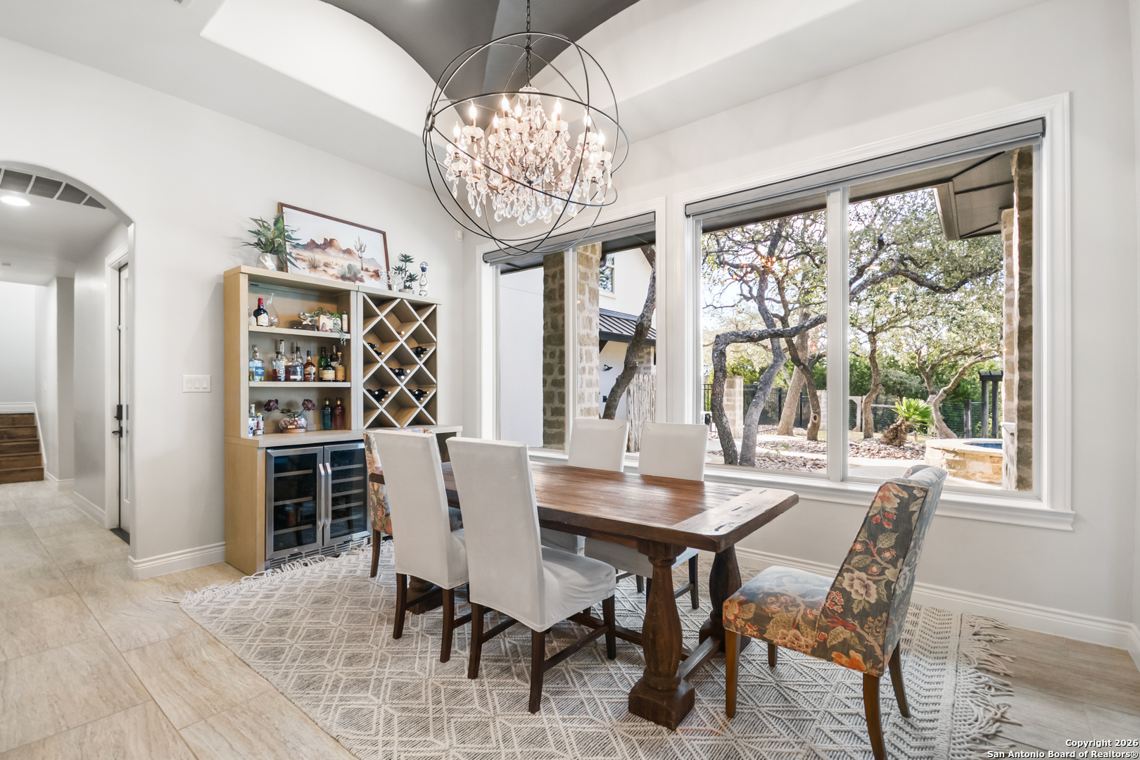 9 Ranch Brook Road Boerne, TX 78015 - Photo 19 of 59 a view of a dining room with furniture window and outside view
