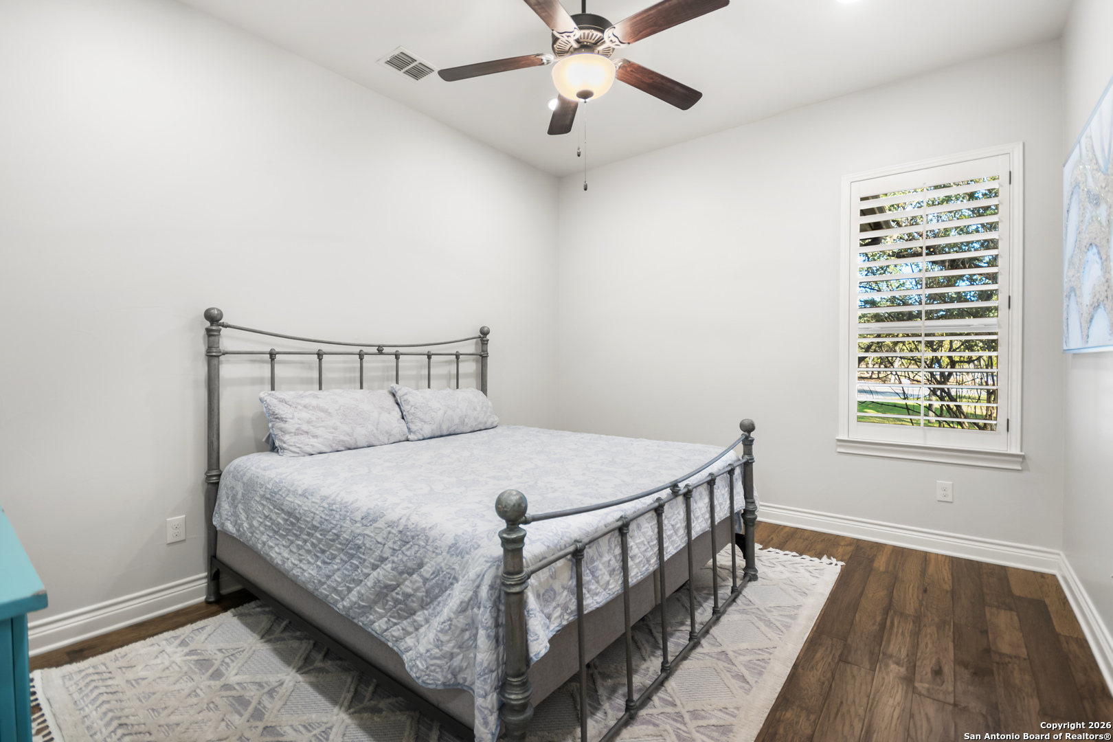 9 Ranch Brook Road Boerne, TX 78015 - Photo 30 of 59 a bedroom with a bed and a window