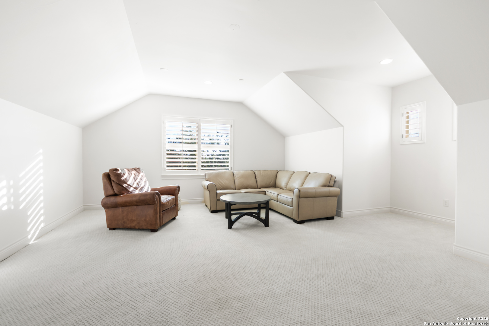 9 Ranch Brook Road Boerne, TX 78015 - Photo 35 of 59 a living room with furniture and a window