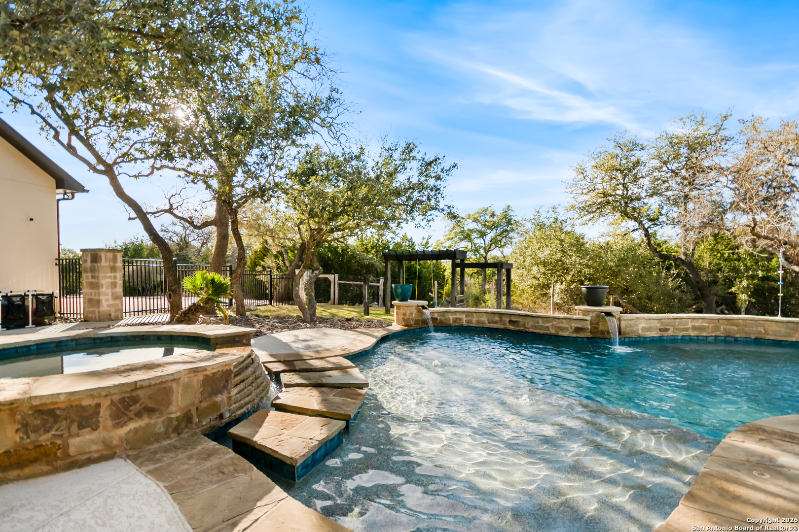 9 Ranch Brook Road Boerne, TX 78015 - Photo 38 of 59 a view of a swimming pool with a patio