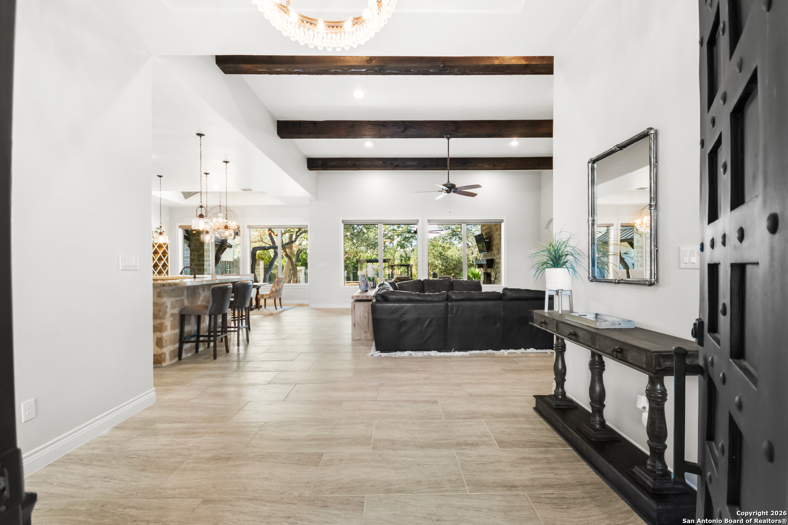 9 Ranch Brook Road Boerne, TX 78015 - Photo 4 of 59 a living room with furniture wooden floor and flat screen tv