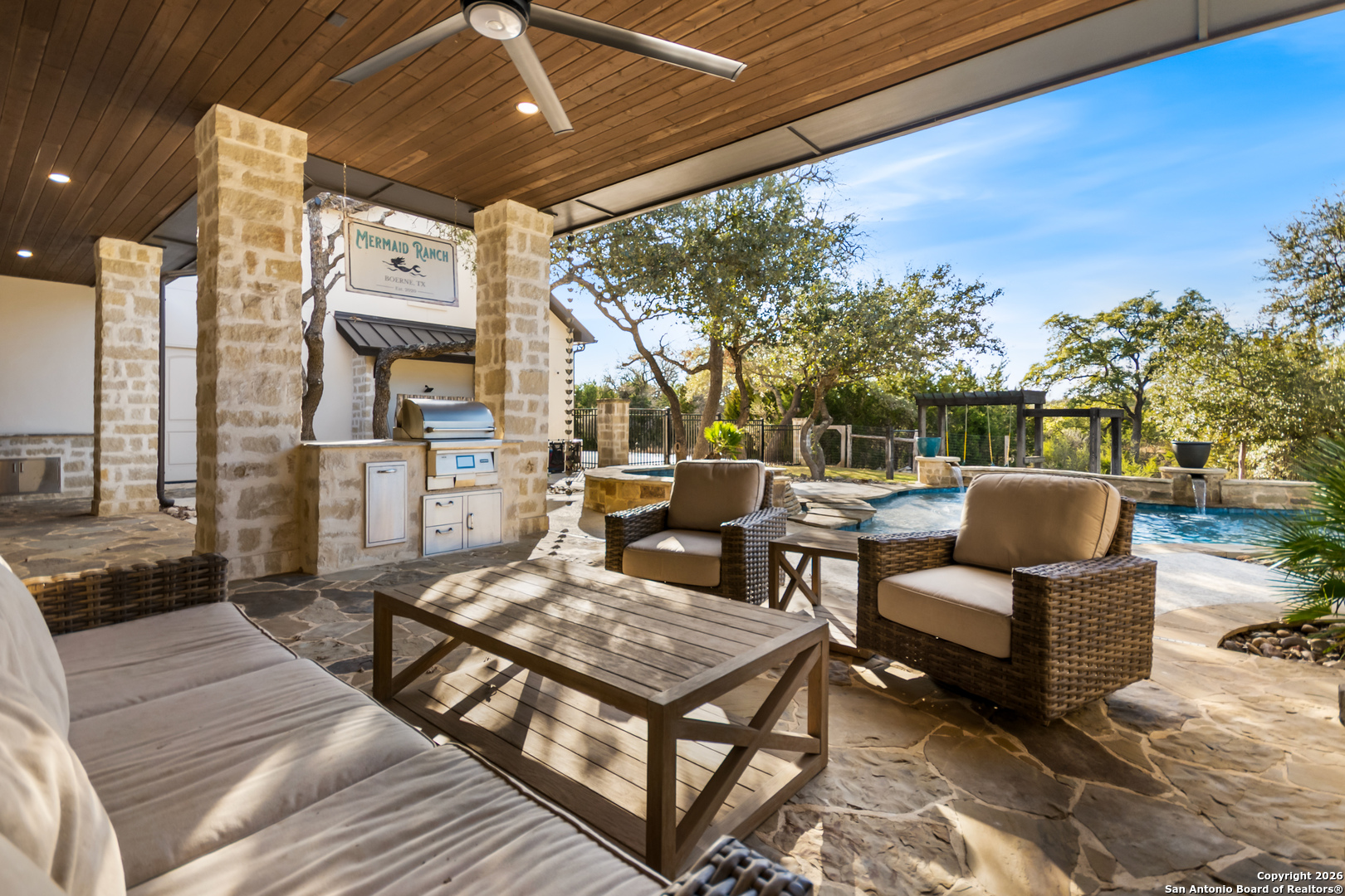 9 Ranch Brook Road Boerne, TX 78015 - Photo 42 of 59 a outdoor living space with patio furniture and a potted plant