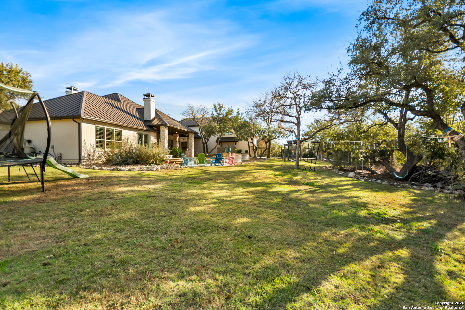 9 Ranch Brook Road Boerne, TX 78015 - Photo 46 of 59 a front view of a house with a yard