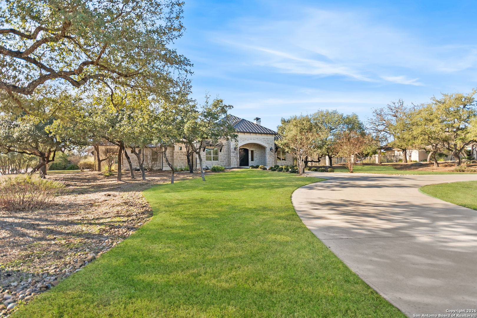 9 Ranch Brook Road Boerne, TX 78015 - Photo 59 of 59 a view of a house with a big yard and large trees