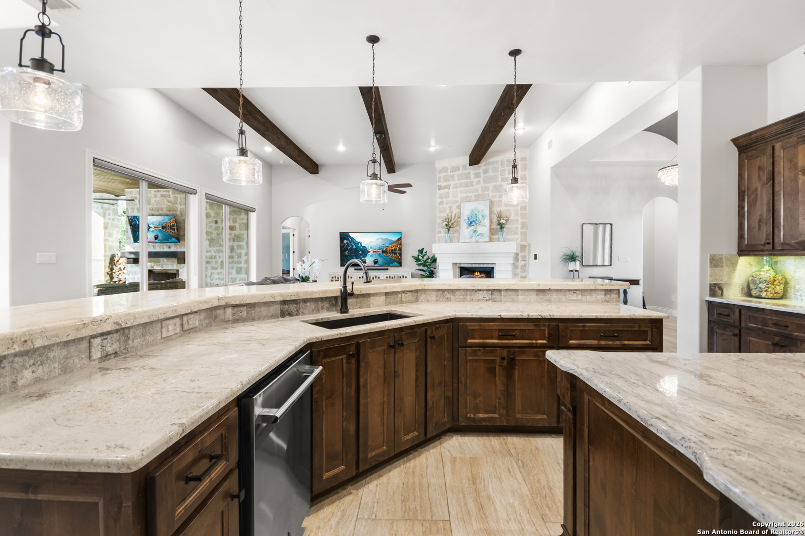 9 Ranch Brook Road Boerne, TX 78015 - Photo 8 of 59 a kitchen with stainless steel appliances granite countertop a sink and stove