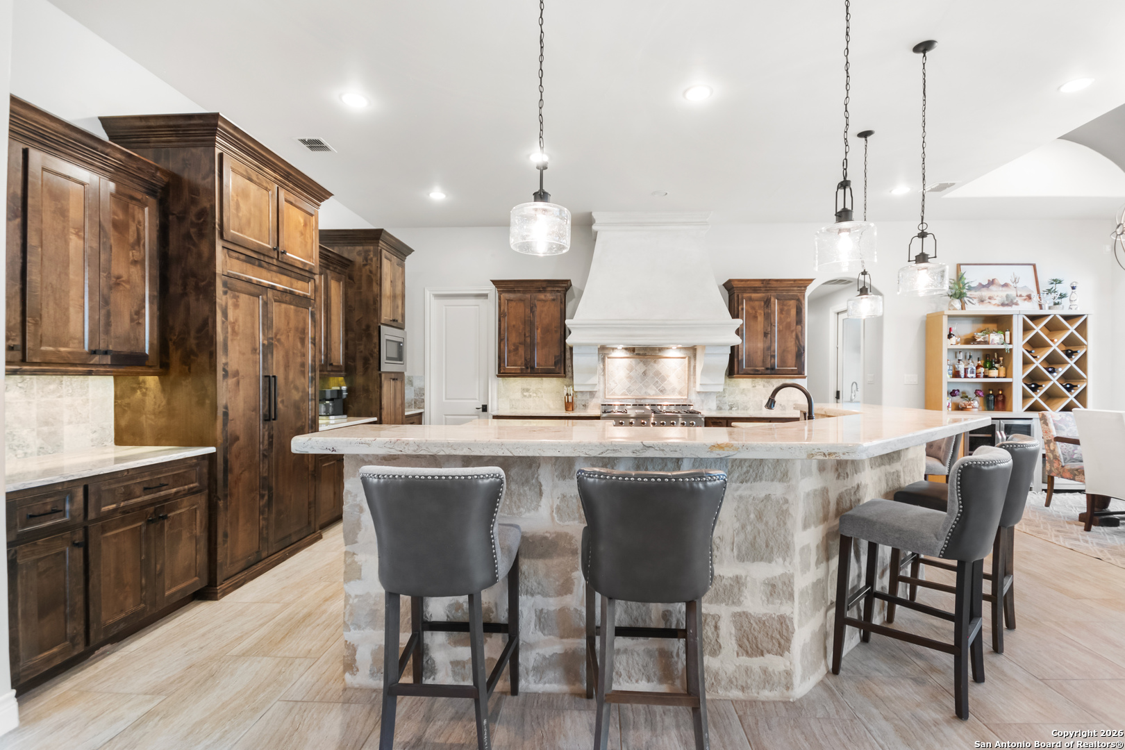 9 Ranch Brook Road Boerne, TX 78015 - Photo 10 of 59 a large kitchen with a table and chairs