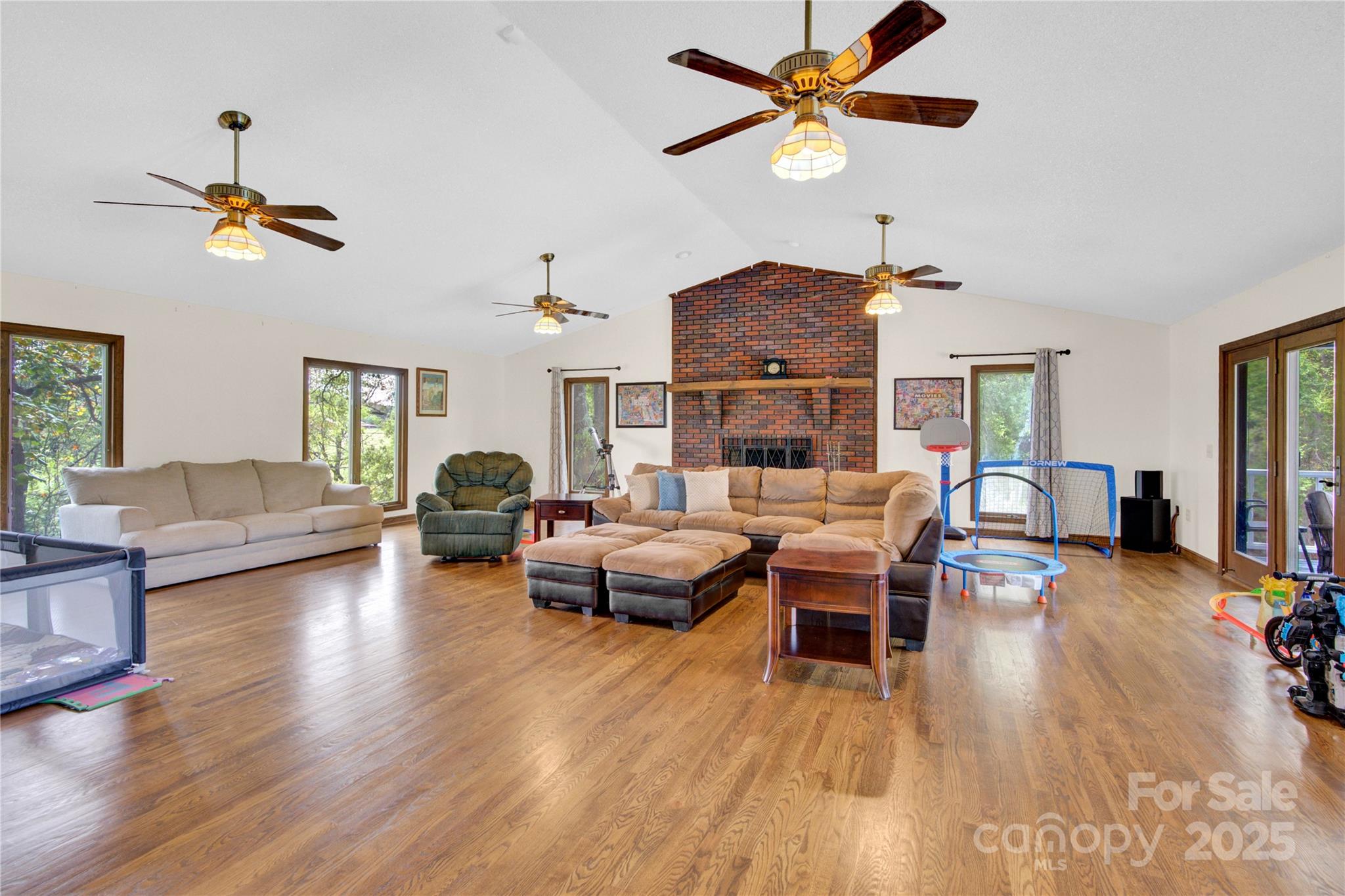 11720 Kluttz Road Gold Hill, NC 28071 - Photo 15 of 35 a living room with furniture and a wooden floor