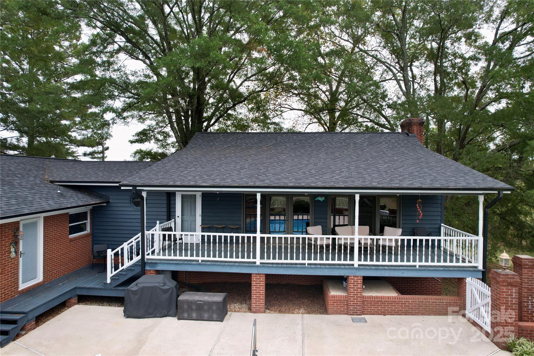 11720 Kluttz Road Gold Hill, NC 28071 - Photo 5 of 35 a view of a house with a deck