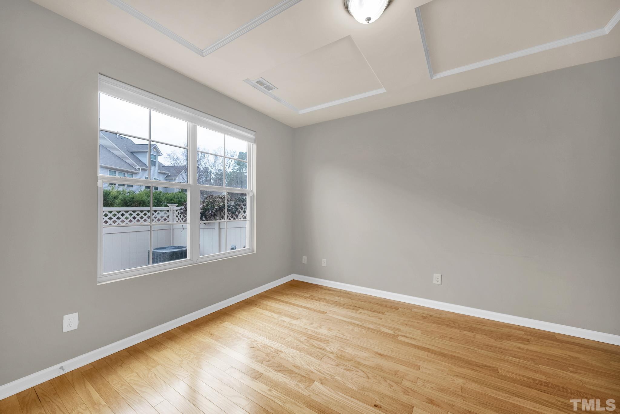 5 Intuition Circle Durham, NC 27705 - Photo 15 of 31 a view of empty room with wooden floor and fan