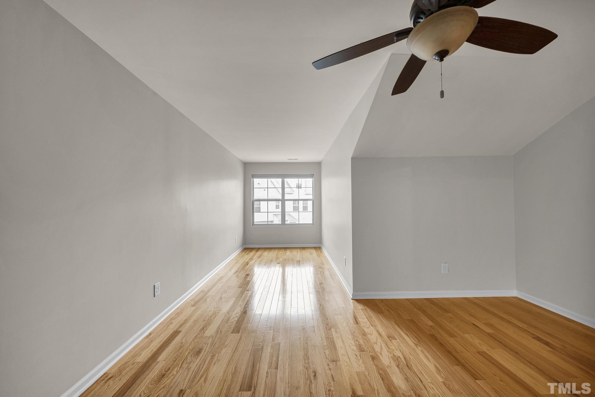 5 Intuition Circle Durham, NC 27705 - Photo 21 of 31 wooden floor in an empty room with a window