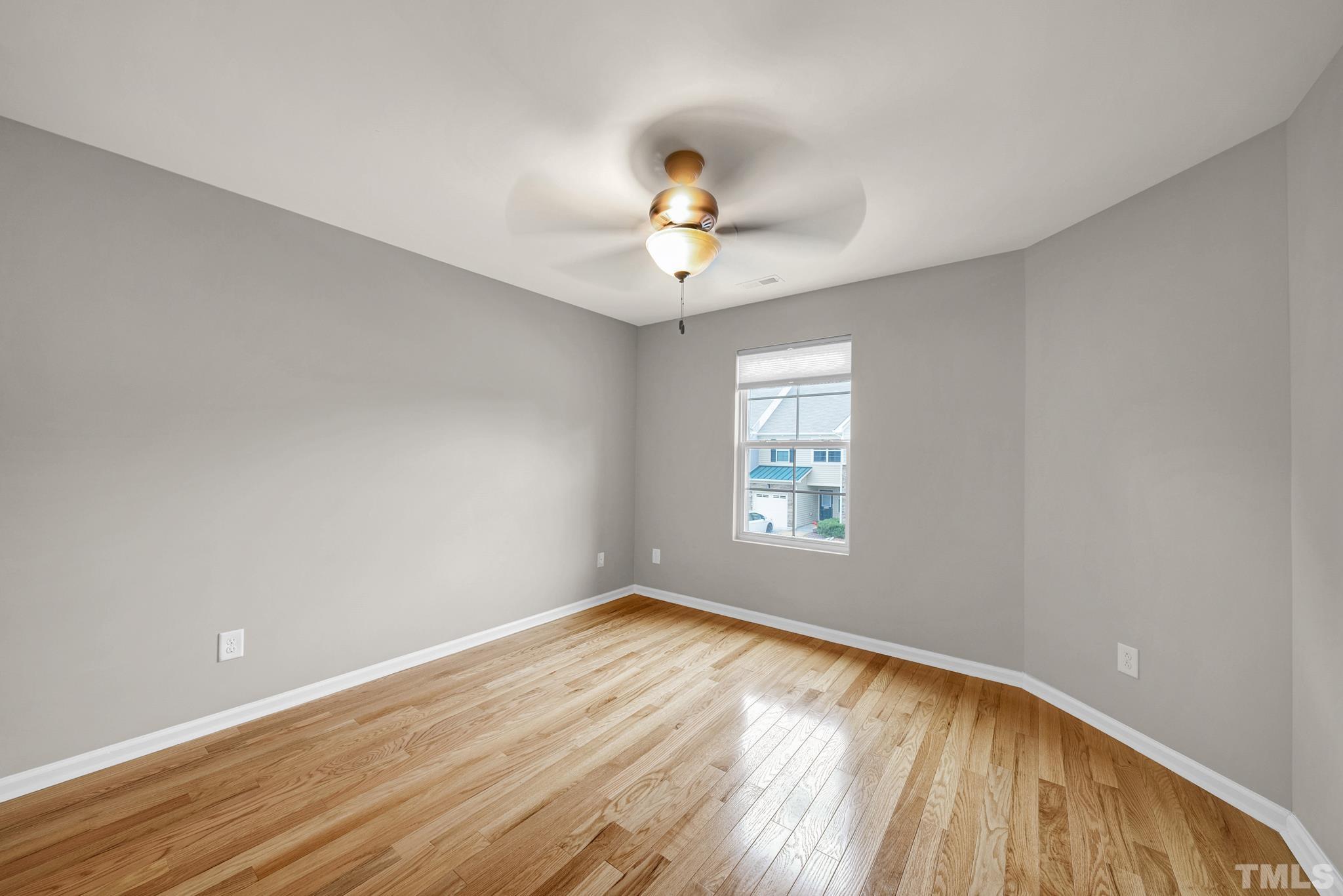 5 Intuition Circle Durham, NC 27705 - Photo 28 of 31 wooden floor in an empty room with a window