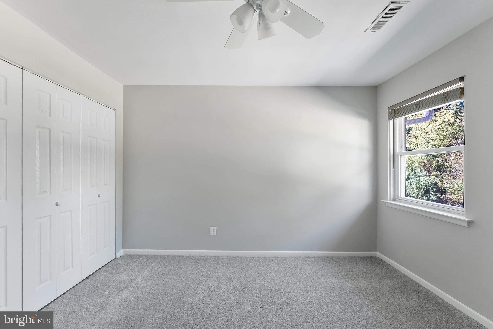 406 Winding Way Westville, NJ 08093 - Photo 16 of 20 an empty room with windows