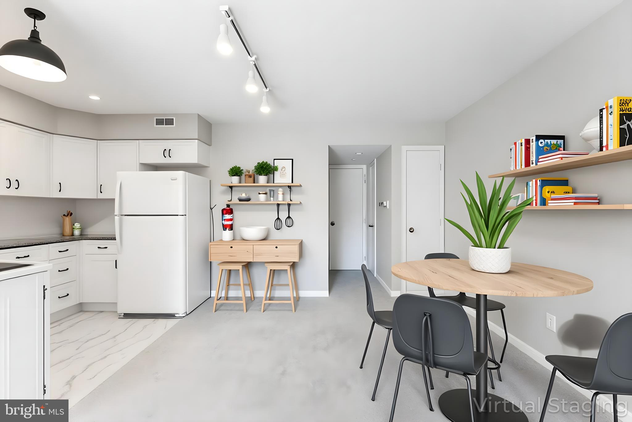 406 Winding Way Westville, NJ 08093 - Photo 6 of 20 a white kitchen with cabinets and stainless steel appliances