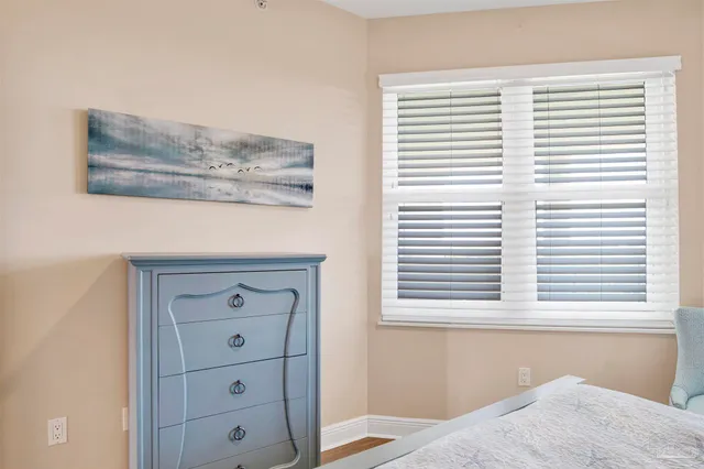a view of a bedroom with a window