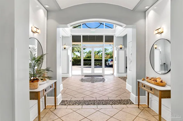 a front view of a house with outdoor seating