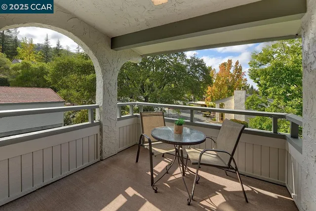 a view of a house with a small yard
