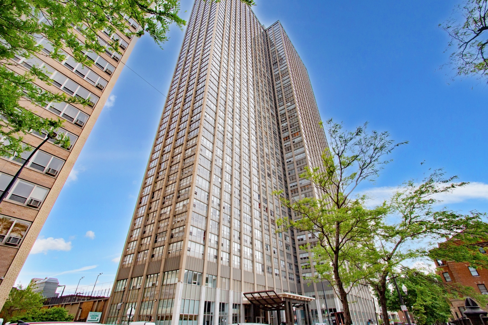 655 West Irving Park Road, Unit 4407 Chicago, IL 60613 - Photo 1 of 19 a view of a multi story building