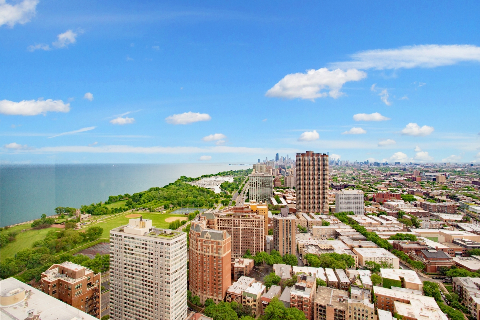 655 West Irving Park Road, Unit 4407 Chicago, IL 60613 - Photo 2 of 19 a city view with tall buildings