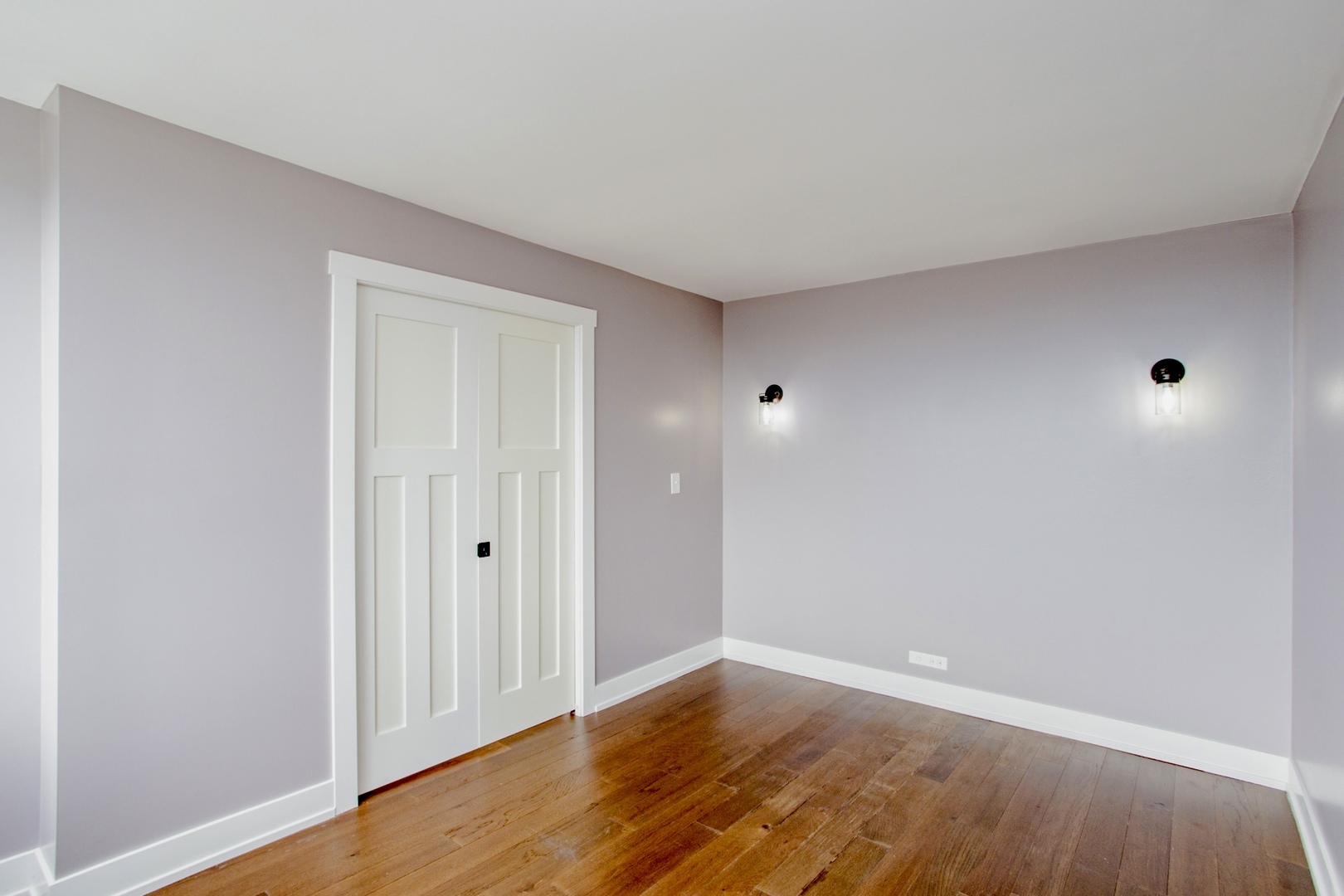 655 West Irving Park Road, Unit 4407 Chicago, IL 60613 - Photo 10 of 19 a view of an empty room with wooden floor