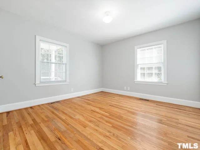 a view of a storage and utility room with a washer dryer
