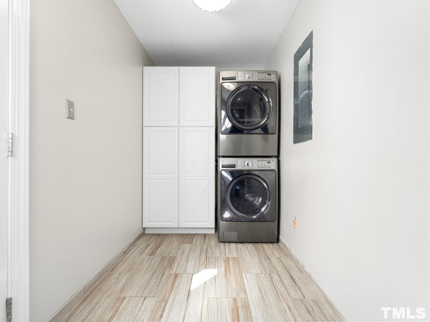 214 Faircloth Street Raleigh, NC 27607 - Photo 18 of 21 a view of a storage and utility room with a washer dryer