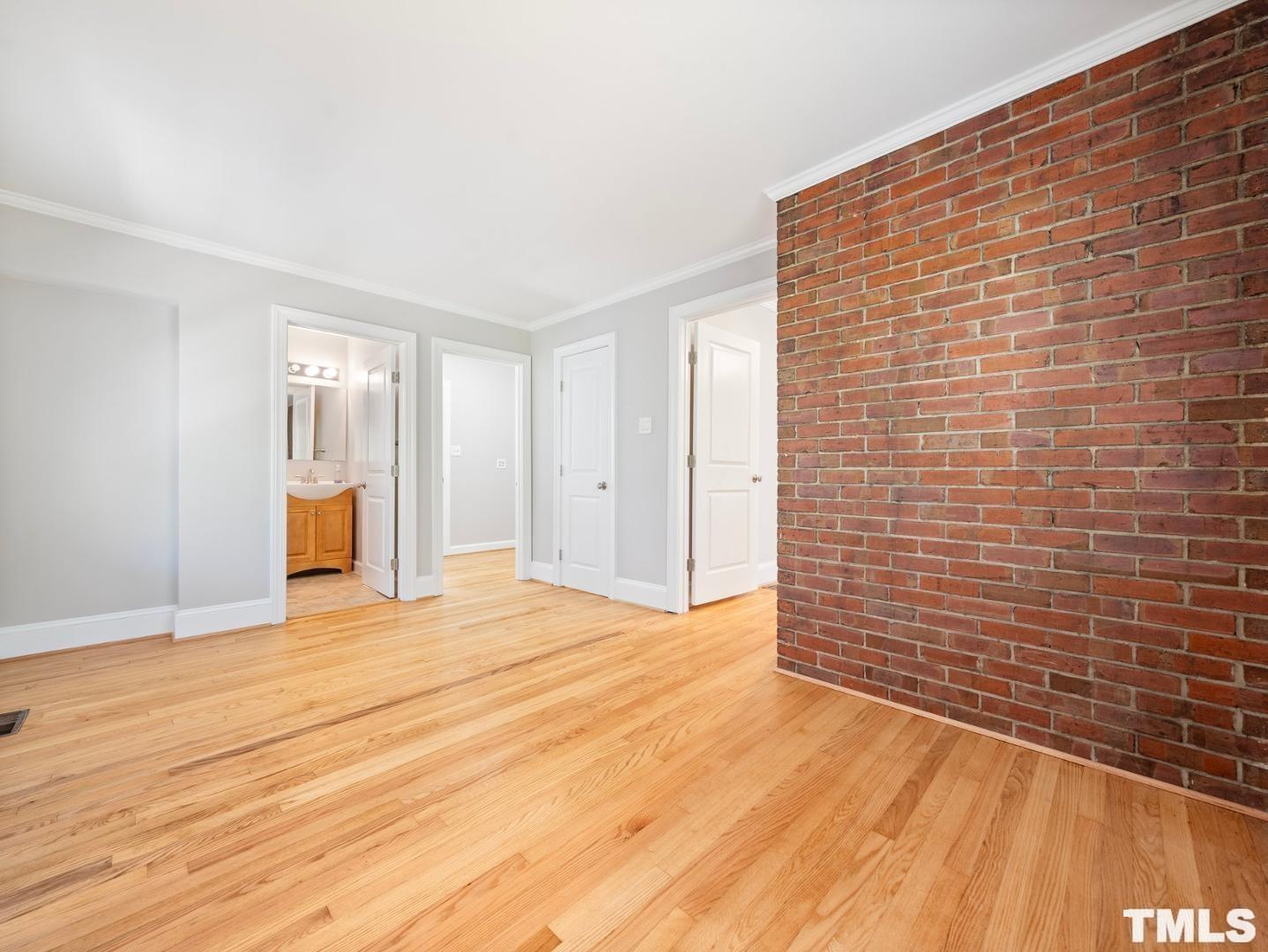 214 Faircloth Street Raleigh, NC 27607 - Photo 21 of 21 a view of an empty room with wooden floor
