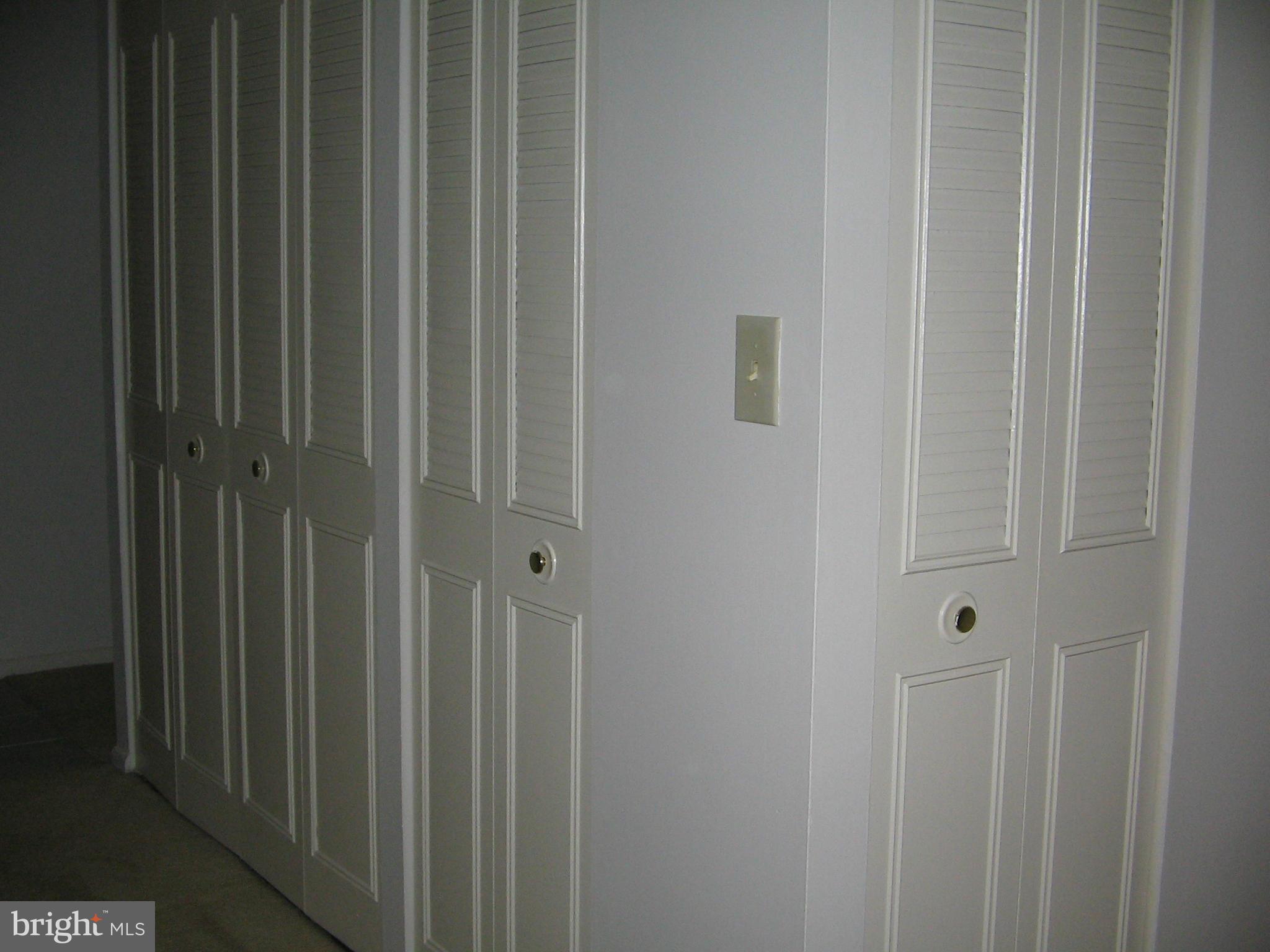 8699 Greenbelt Road, Unit 102 Greenbelt, MD 20770 - Photo 3 of 19 Foyer with closet space