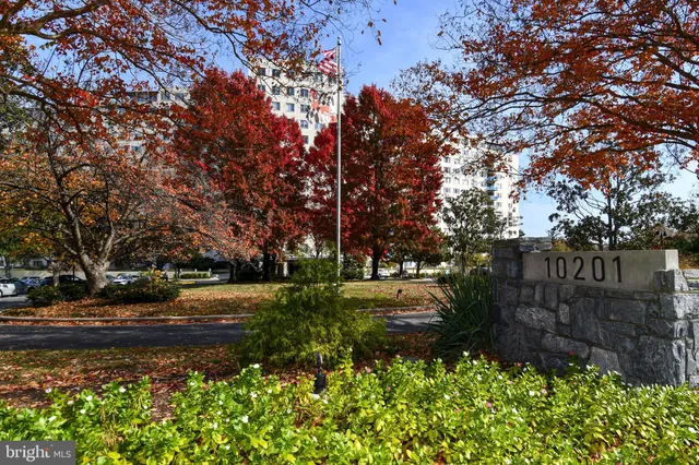 a view of a street with a bench