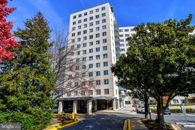 a front view of a building with garden