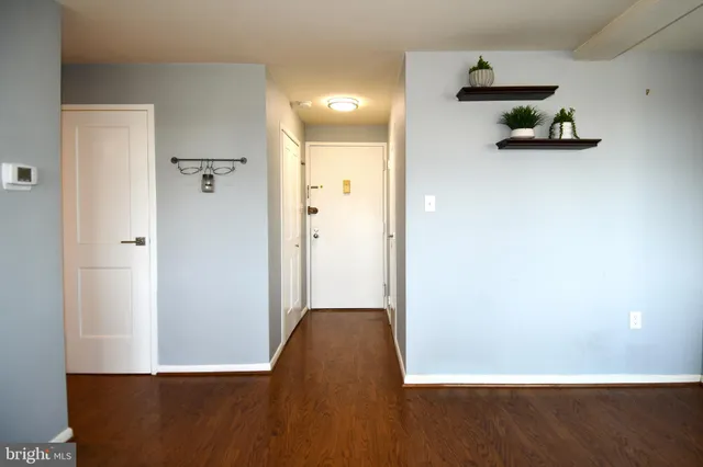 a view of a hallway with closet