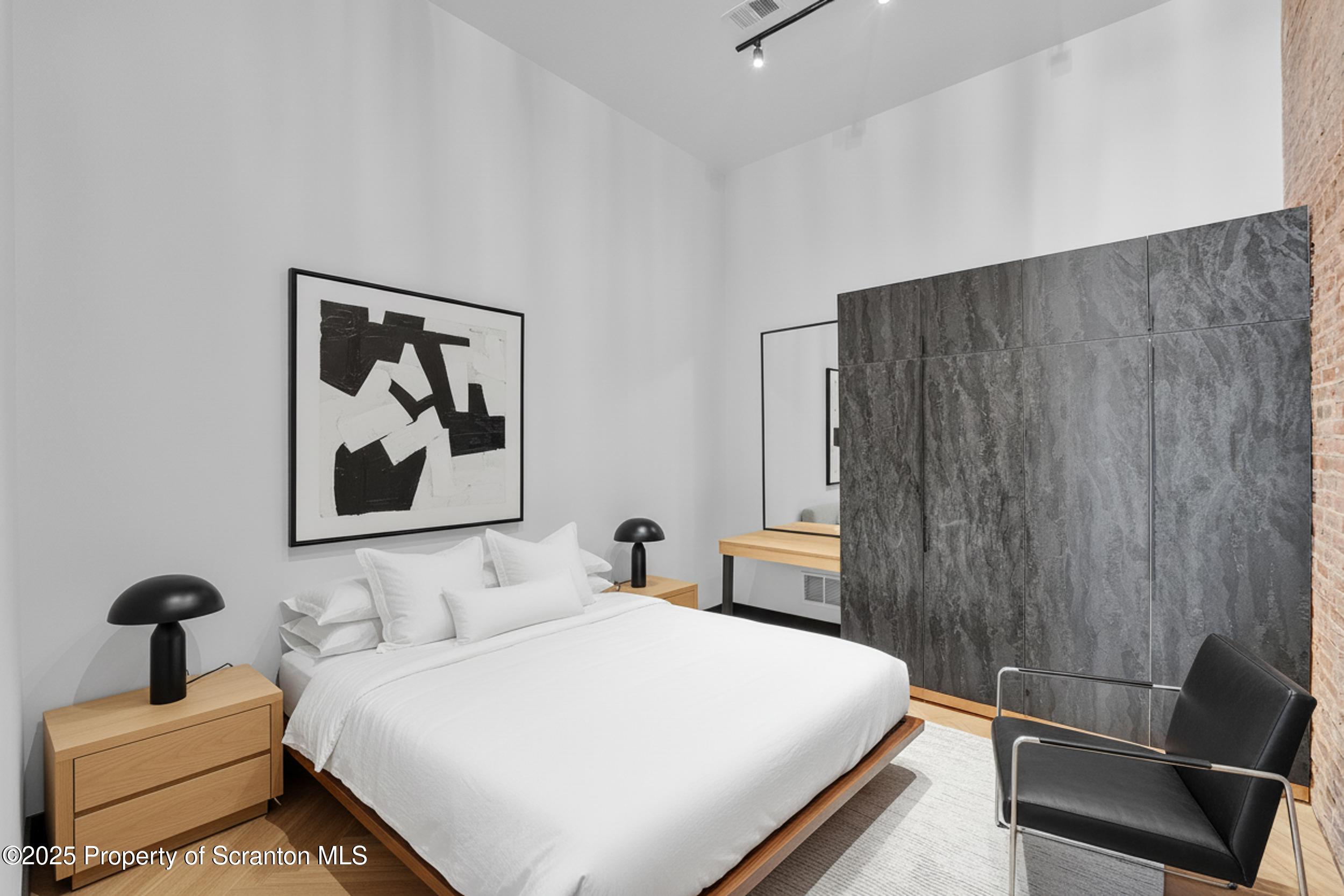 117 Penn Avenue, Unit 100 Scranton, PA 18503 - Photo 10 of 46 modern minimalist bedroom staging.png