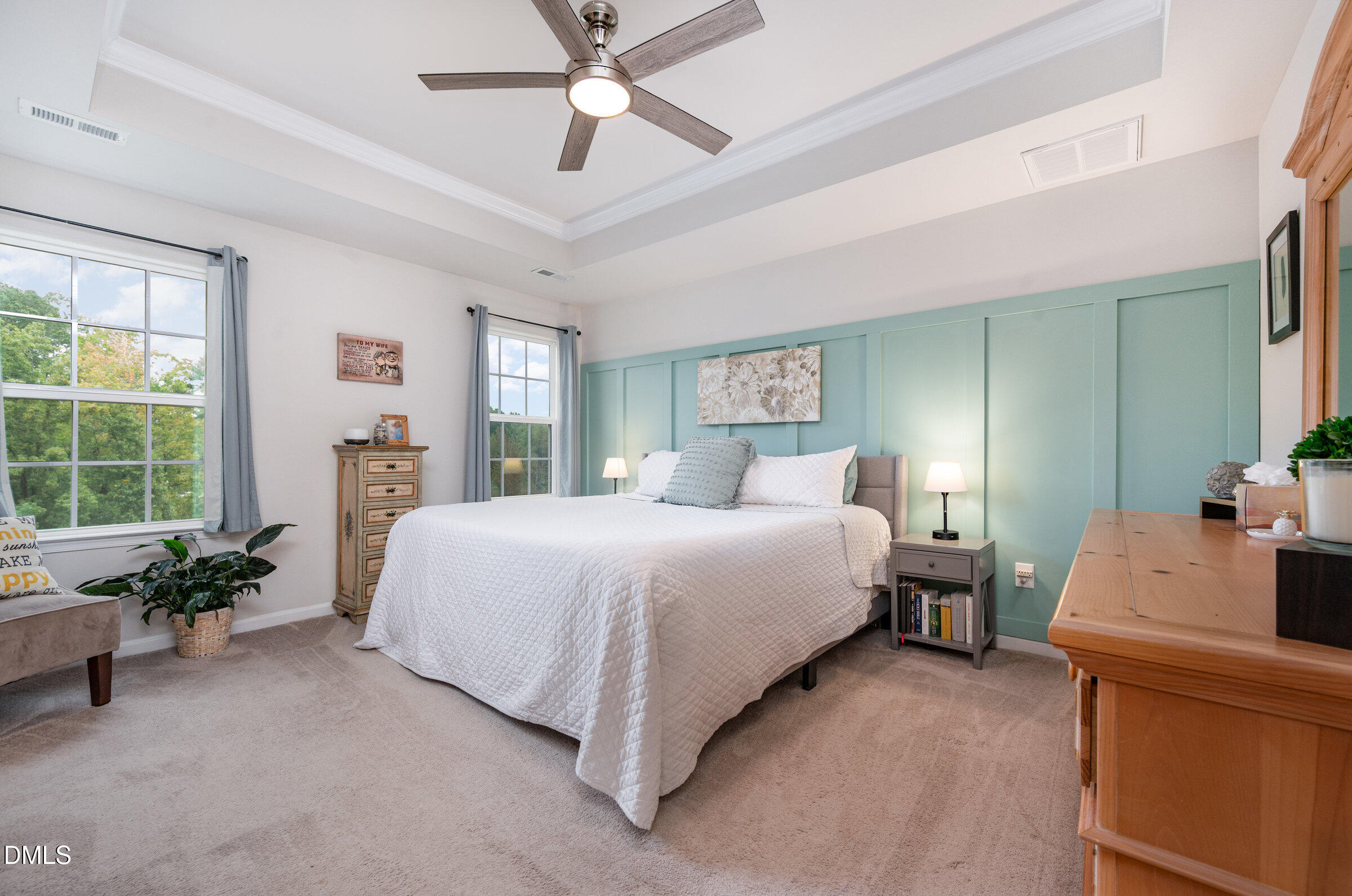 372 Amber Acorn Avenue Raleigh, NC 27603 - Photo 12 of 49 a bedroom with a bed wooden floor and window
