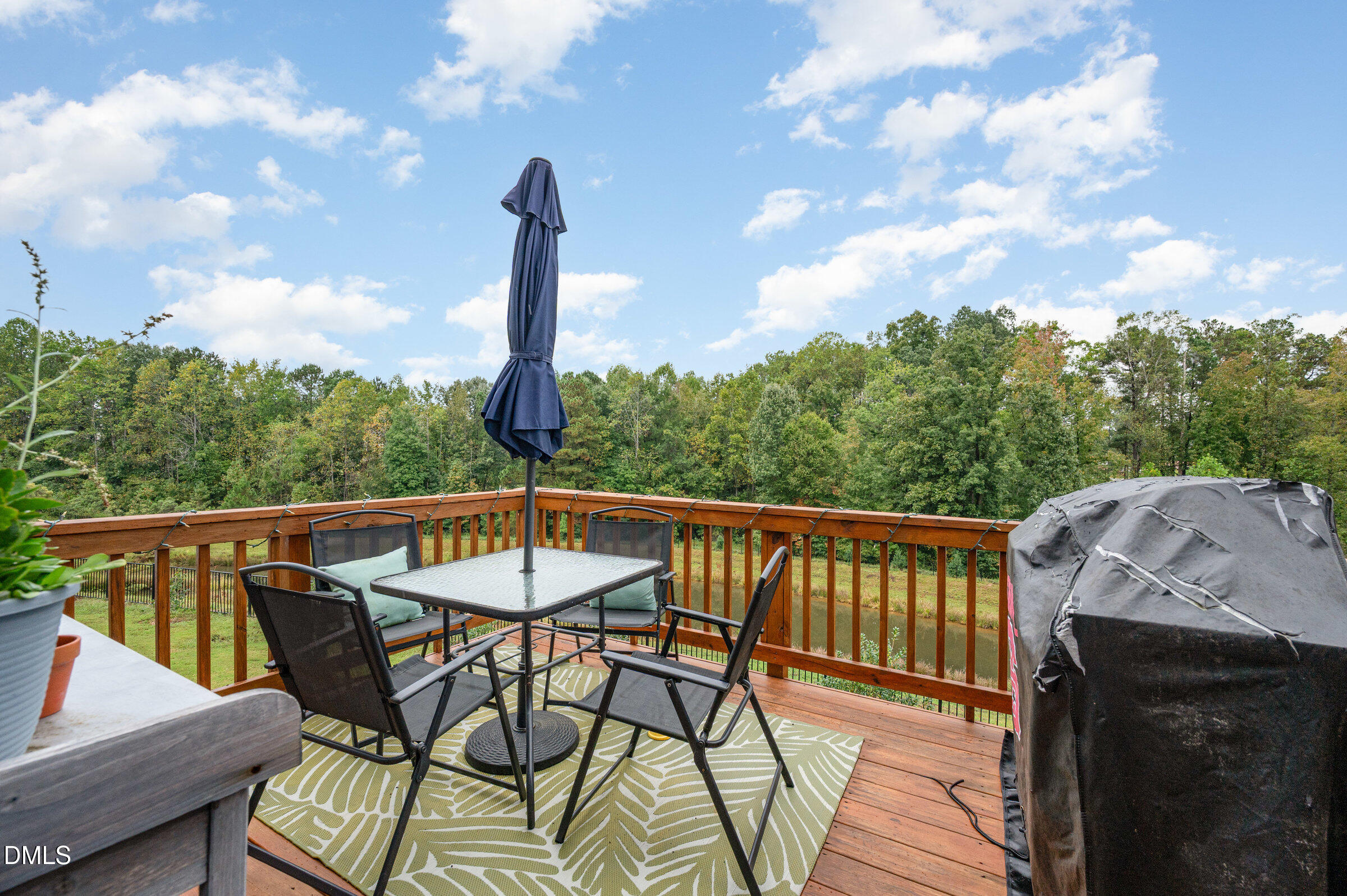 372 Amber Acorn Avenue Raleigh, NC 27603 - Photo 23 of 49 a view of a balcony with furniture