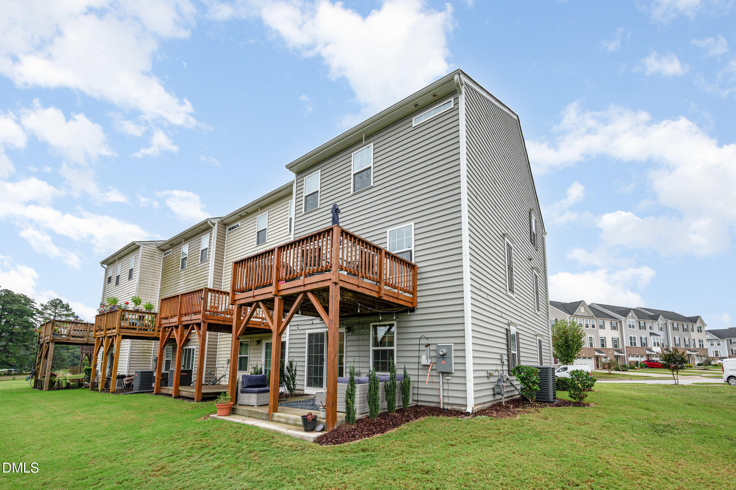 372 Amber Acorn Avenue Raleigh, NC 27603 - Photo 24 of 49 a view of a house with a yard