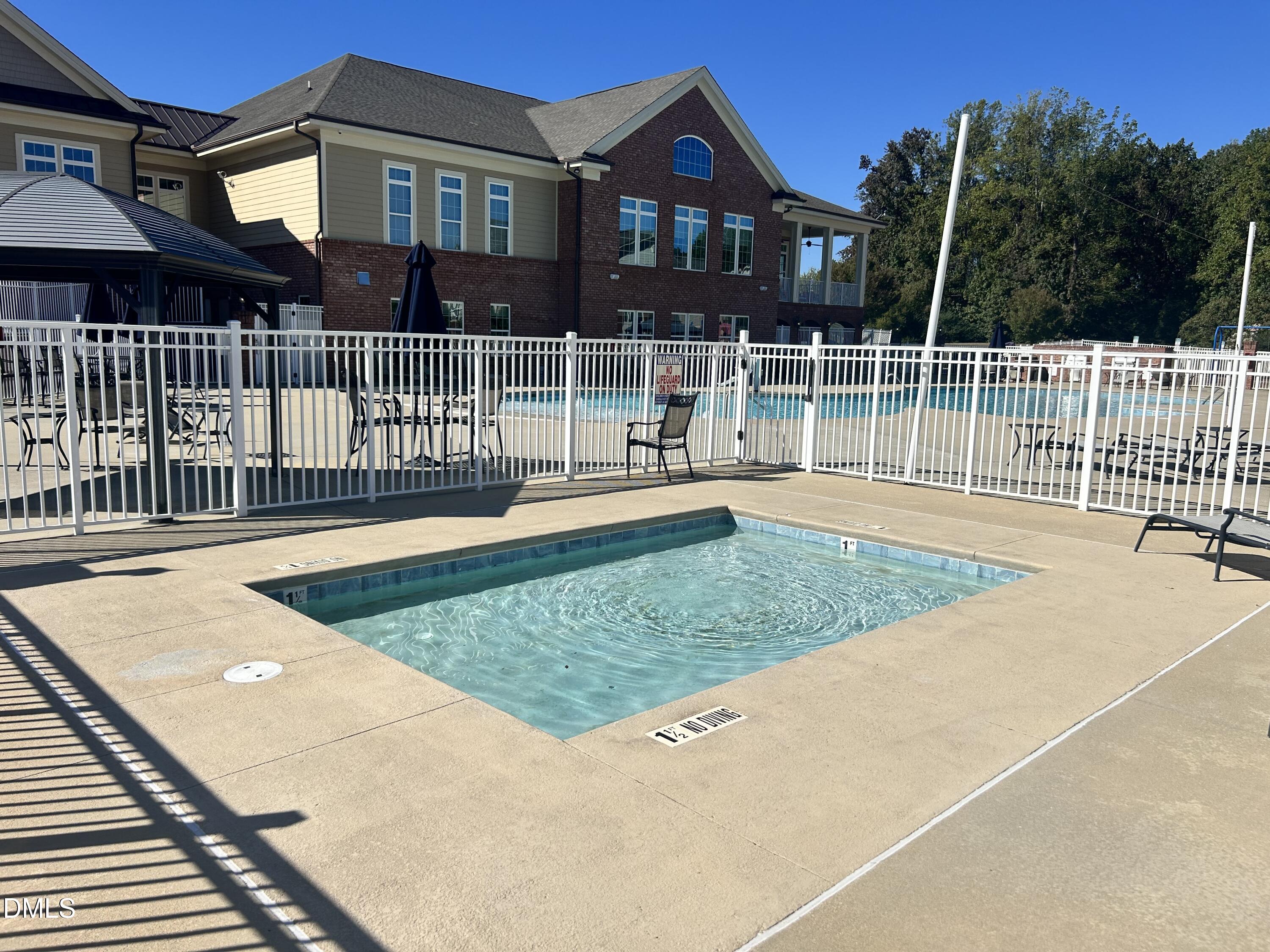372 Amber Acorn Avenue Raleigh, NC 27603 - Photo 27 of 49 a view of a house with a backyard