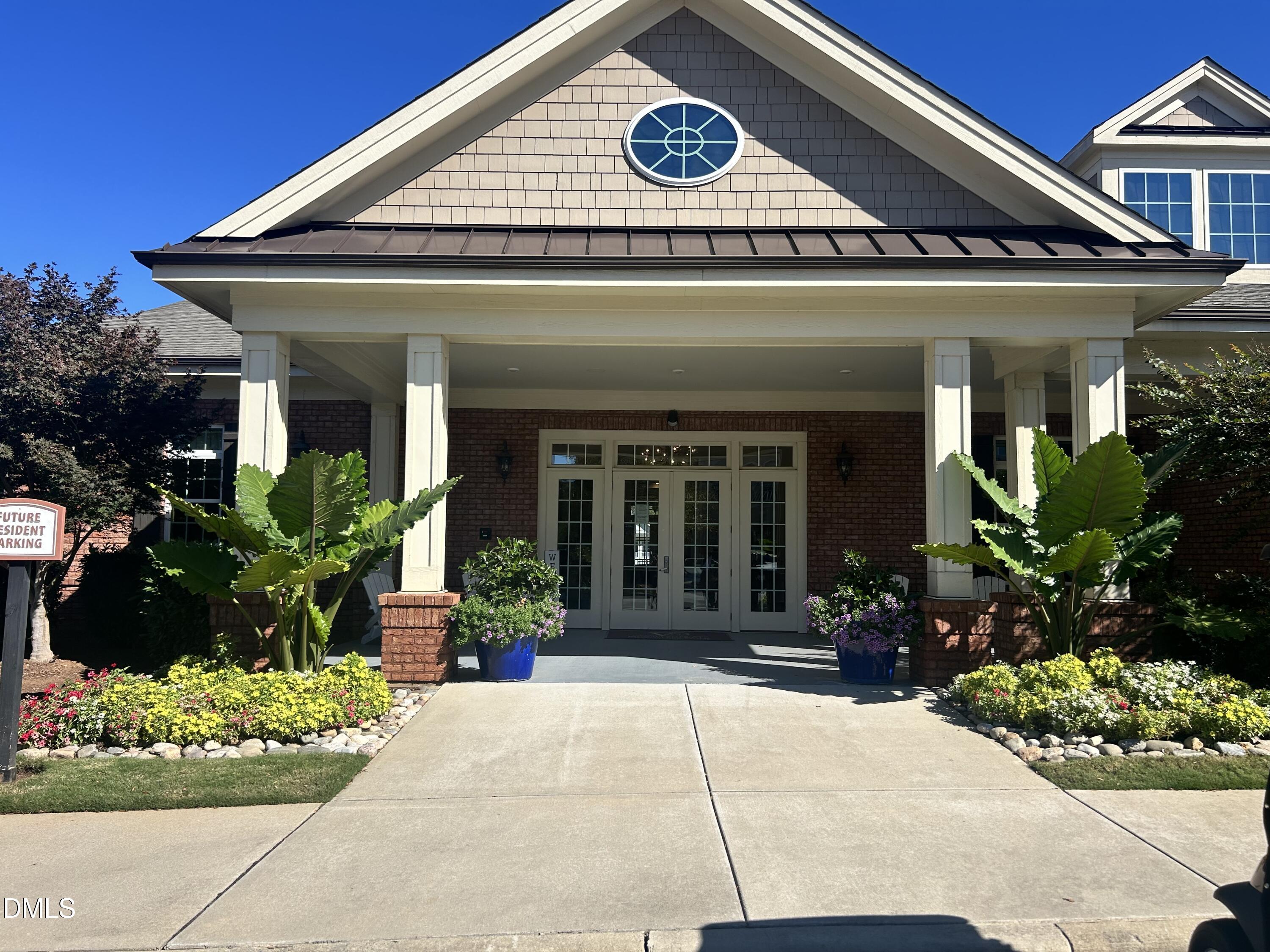 372 Amber Acorn Avenue Raleigh, NC 27603 - Photo 31 of 49 a view of a house with potted plants