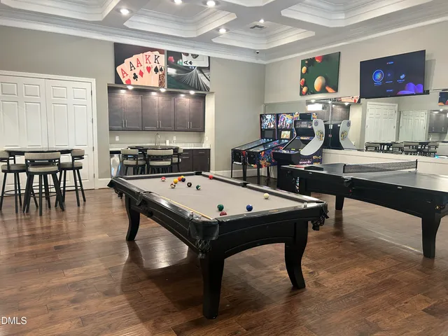 a view of a lobby with furniture and a chandelier